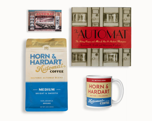 Horn & Hardart coffee packaging, mug, and book on a white background
