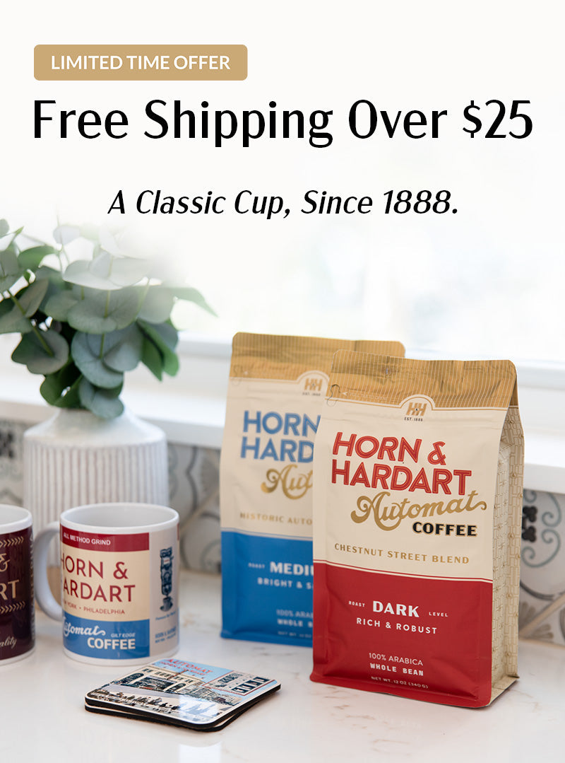 Horn & Hardart coffee packages and a mug on a table with "Free Shipping over $25" promotional text.