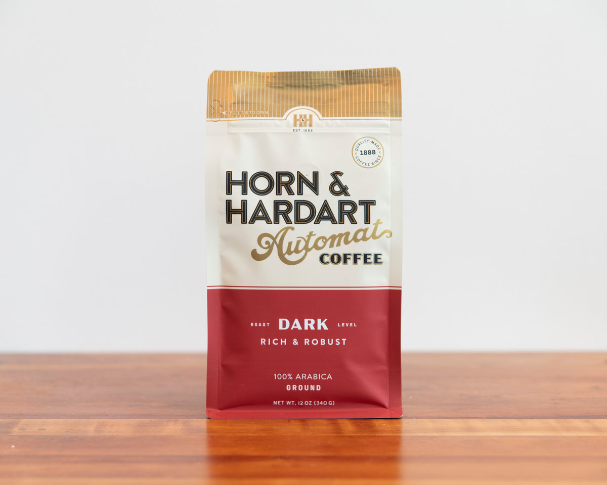 Horn & Hardart Dark Roast Automat Coffee bag sitting on a wooden surface