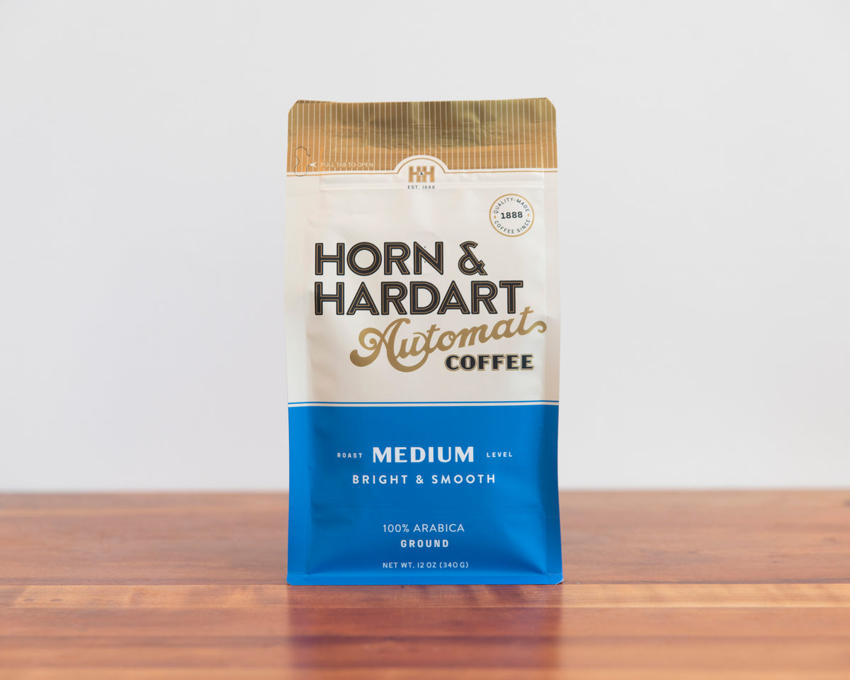 Horn & Hardart Medium Roast Automat Coffee bag sitting on a wooden surface