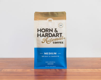 Horn & Hardart Medium Roast Automat Coffee bag sitting on a wooden surface
