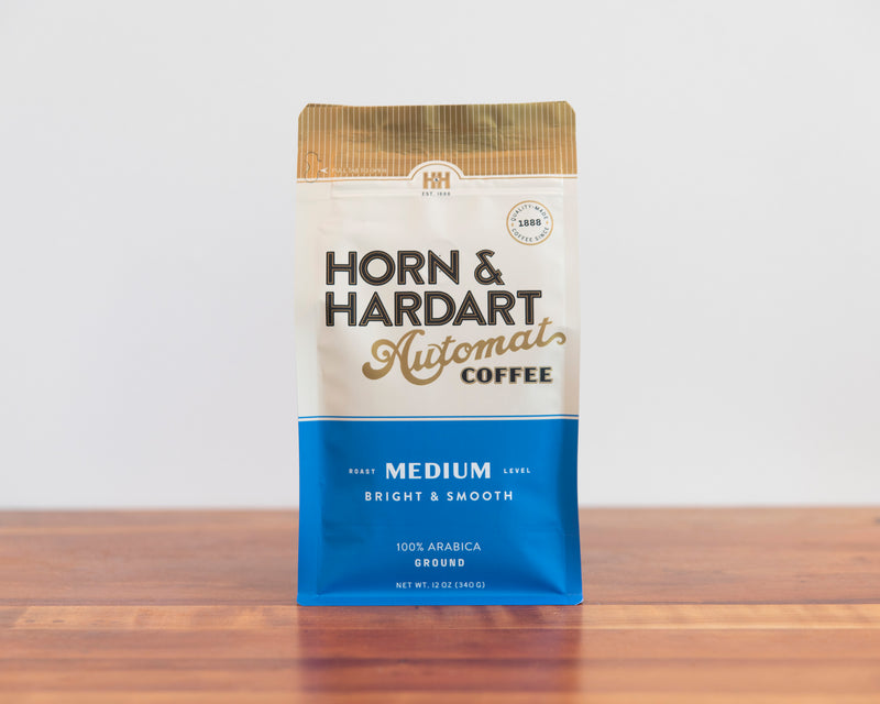 Horn & Hardart Medium Roast Automat Coffee bag sitting on a wooden surface