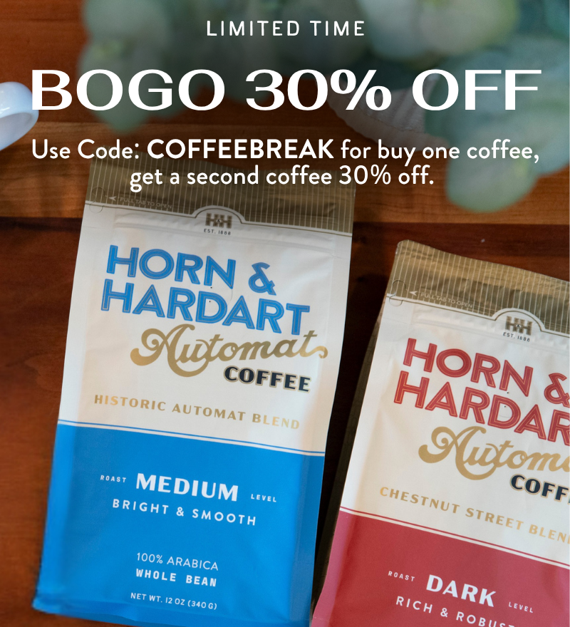 Promotional graphic for Horn & Hardart Automat Coffee showing two coffee bags on a wooden surface with large sale text reading 'BOGO 30% OFF' and 'Use Code: COFFEEBREAK for buy one coffee, get a second coffee 30% off.'.