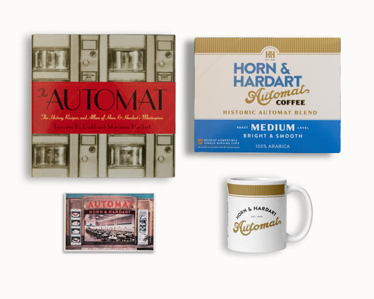 Collection of Horn & Hardart Automat coffee products including a book, coffee package, and mug.