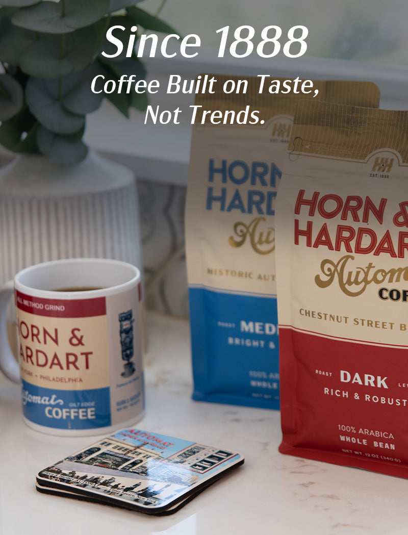 Horn & Hardart coffee packages and a mug on a table with promotional text. "Since 1888"