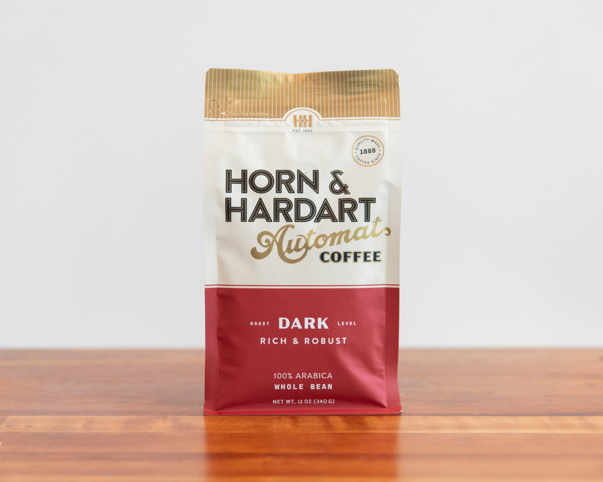 Horn & Hardart Dark Roast Automat Coffee bag sitting on a wooden surface
