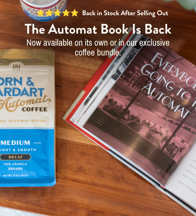 The Automat Book is Back, historic H&H facade next to image of book and coffee bag. 