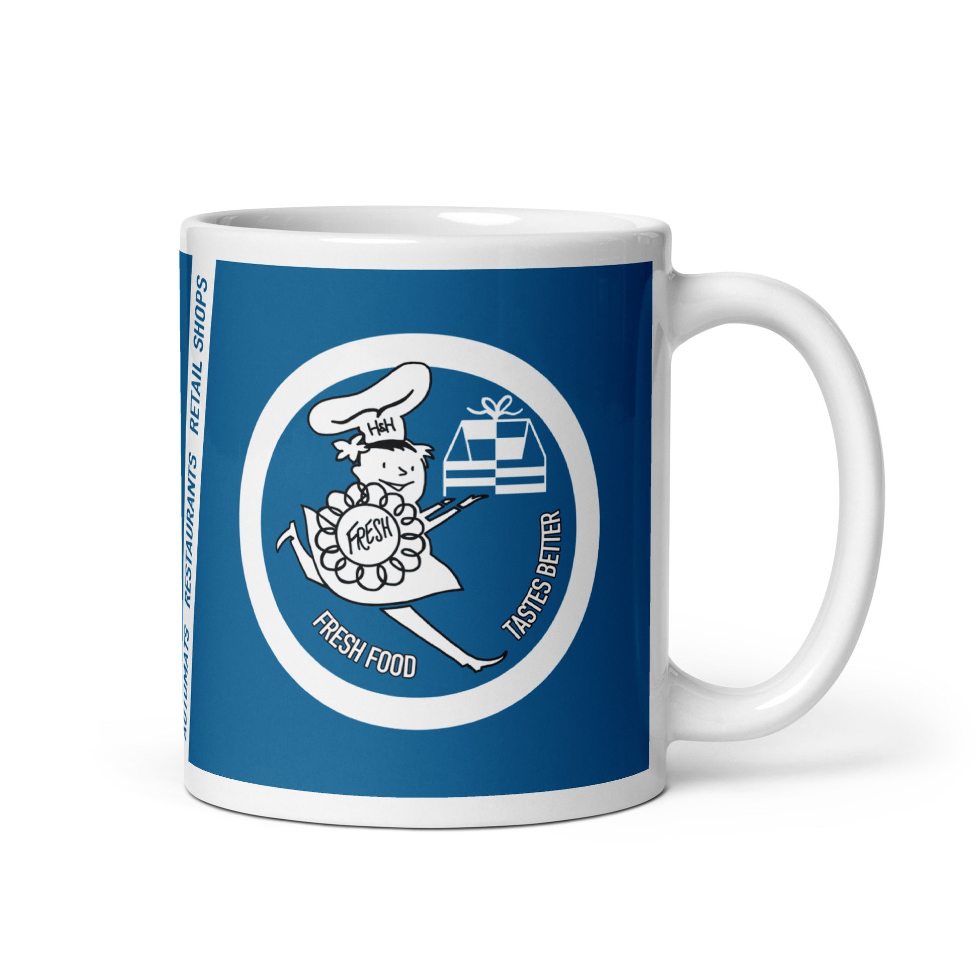 White mug with blue design featuring a cartoon character and text on a white background